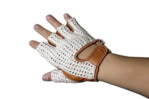 Hand wearing a crochet and leather cycling glove.