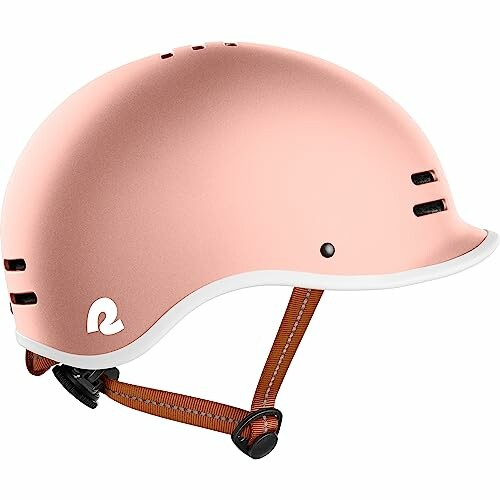 Pink bike helmet with adjustable strap