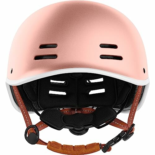 Front view of a pink ski helmet with chin straps